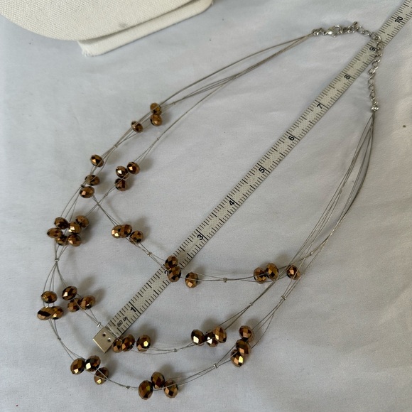 Sparkly faceted copper bead infinity style necklace - Picture 3 of 4